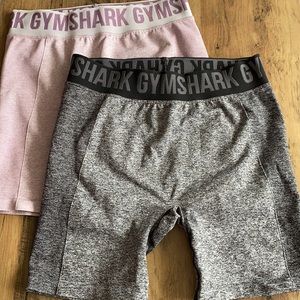 set of 2 gymshark large black and purple bike shorts (like new)